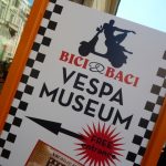Image of the sign for the Bici and Baci Vespa Museum, Rome