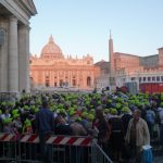 Image of people waiting for space waiting at St Peters, Rome