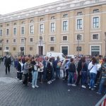 Image of people waiting, larger crowds at St Peters Square, Rome
